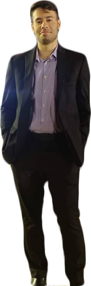 Full-body portrait of Abdullah Ahmad in a suit, presenting a professional appearance suitable for a portfolio or business profile.